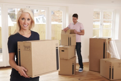 Furniture dismantling and office setup during a commercial relocation