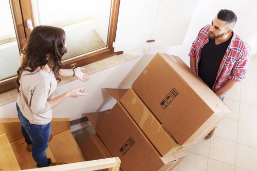 Loading furniture and boxes into a van for a Lambeth move